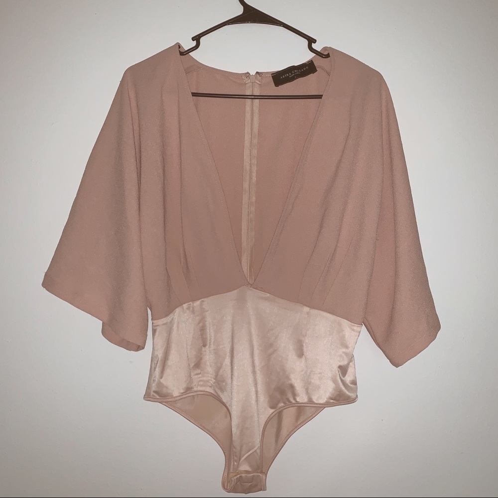 Deep cut bodysuit